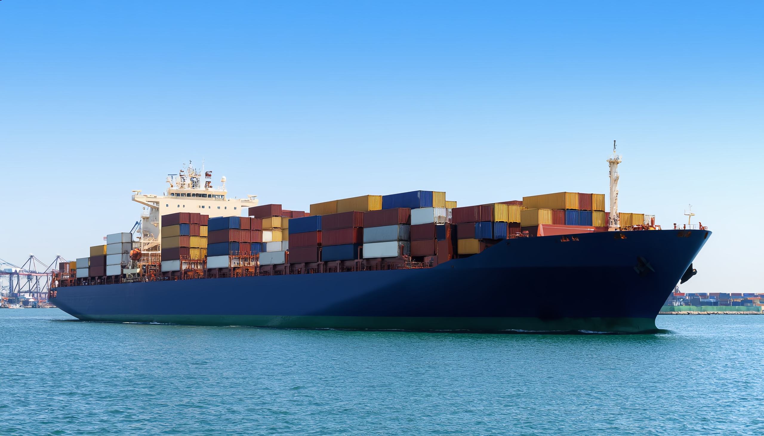 16x9_Photo_realistic_cargo_ship_at_se